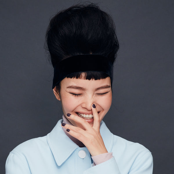 Hair by Sam McKnight Easy Up Do Texture Spray on model