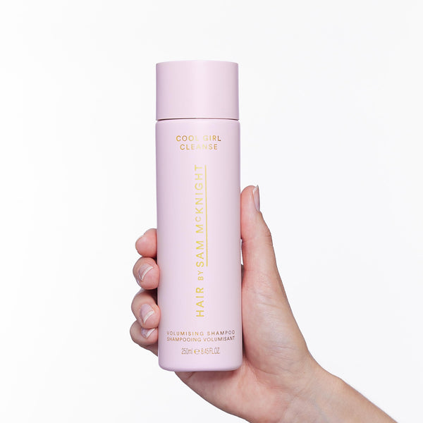 Hair by Sam McKnight Cool Girl Volume Cleanse Shampoo being held